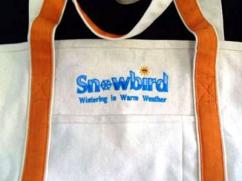 Snowbirds Orange And White Tote